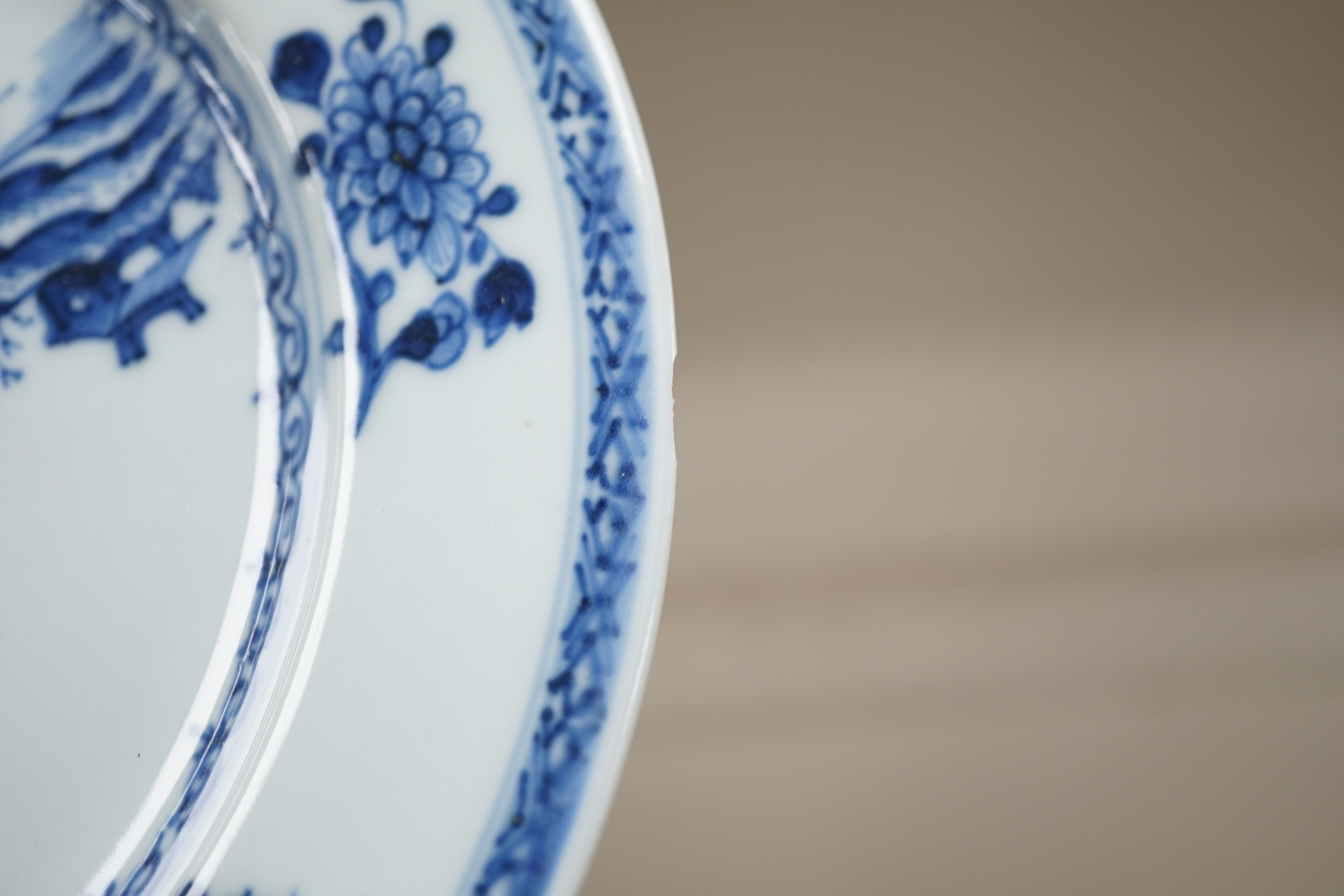 A set of twelve Chinese Nanking Cargo ‘Boatman’ blue and white plates, Qianlong period